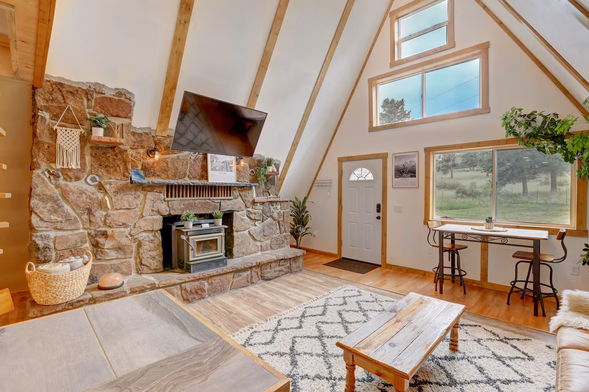 Interior of Lowkey A-Frame cabin near Denver — remodeled authentic 1960s A-frame in Pine, Colorado